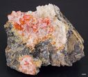 Vanadinite_Crystals_On_Calcite_Old_Yuma_Mine_Arizona.jpg